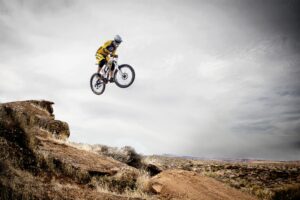 A person on a motorbike off-roading in West Texas land