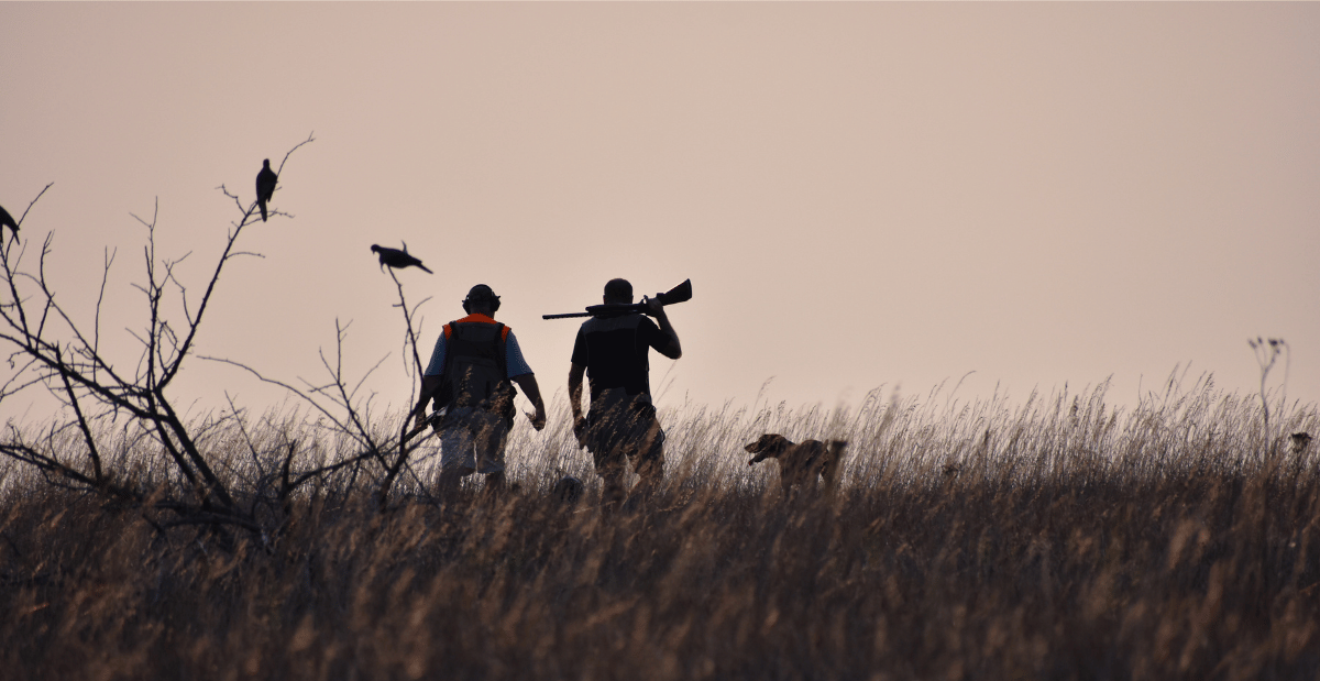 2 hunters and a hunting dog